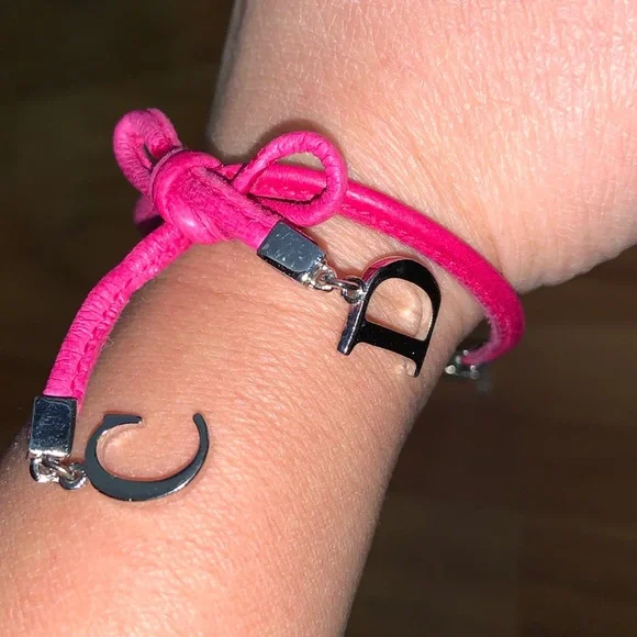 Authentic Christian Dior Leather and Metal Charm Bow Bracelet - Picture 11 of 11